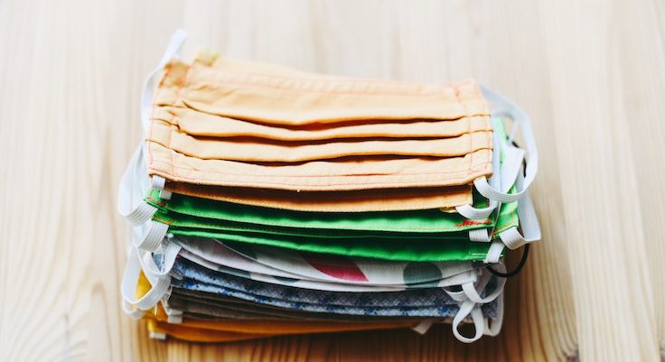 fabric masks in a pile